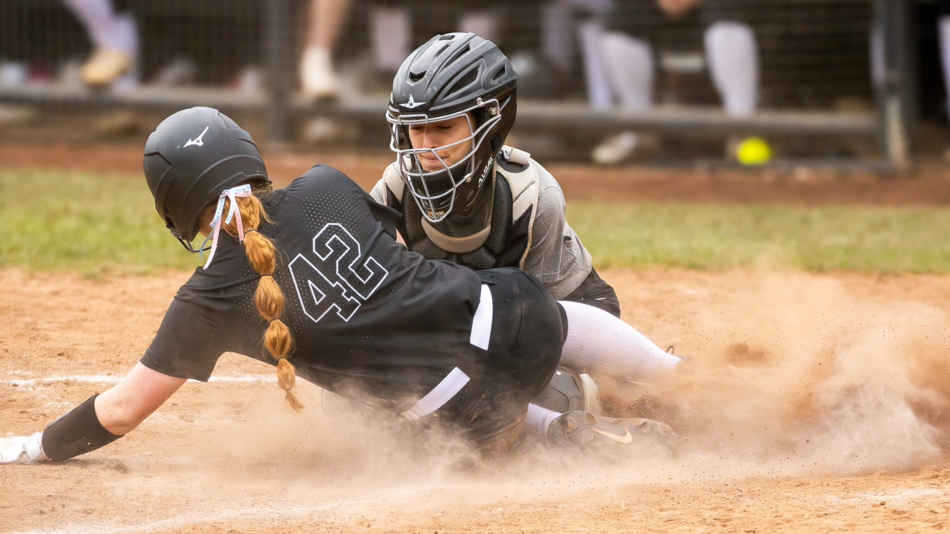 Raigan Chavez tags the runner out at home. Photo by Tiana Lecker